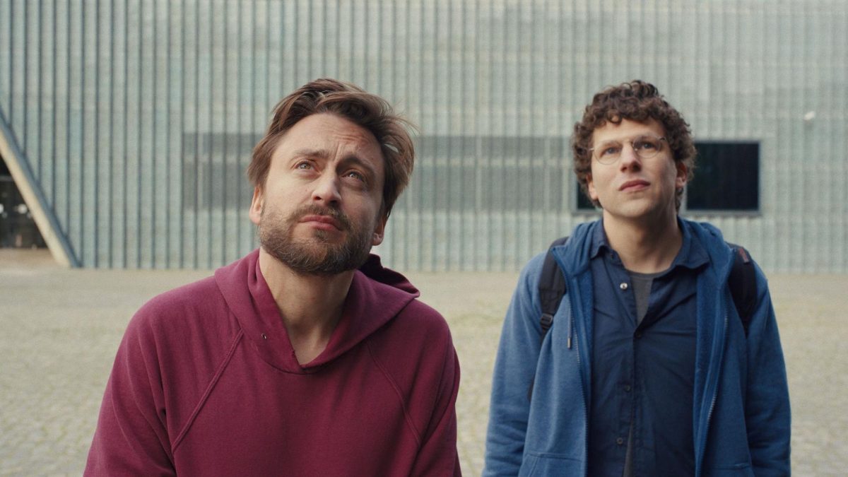 Academy Award nominated Jesse Eisenberg (right) and Kieran Culkin (left) star in "A Real Pain"—a poignant film that manages to remarkably walk the line of humor and melancholy.