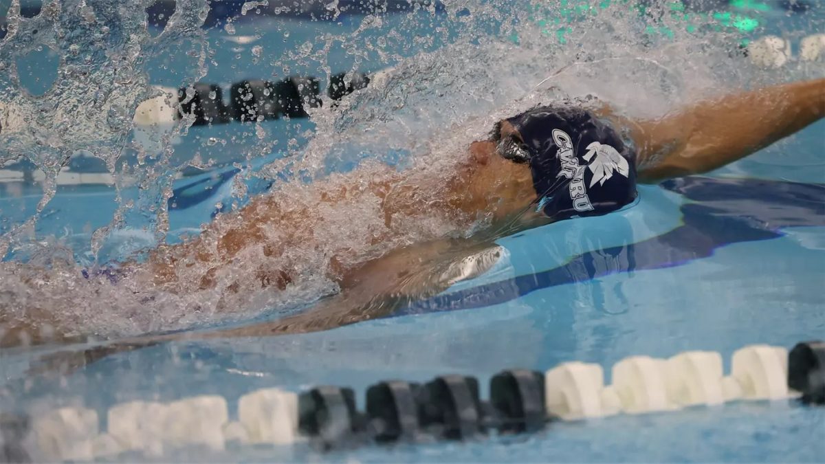 Third-year Emil LaSida set a school record in the 400-yard freestyle relay with third-year William Froass and fourth-years Mason Bencurik and John Drumm this past weekend.