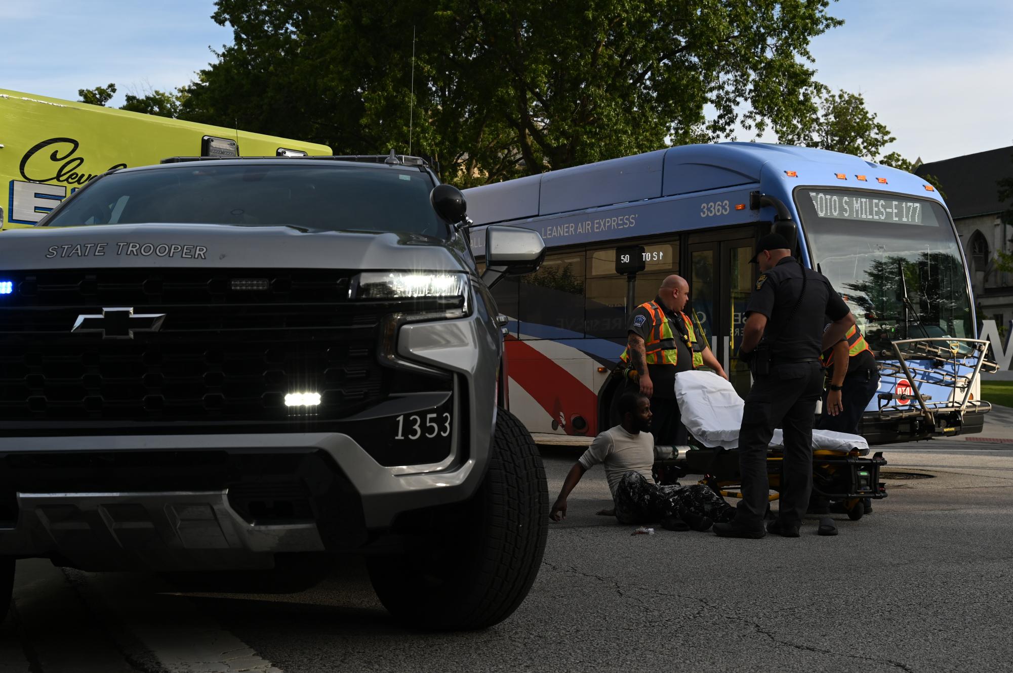 The teenager involved in the shooting was taken to University Hospitals after being apprehended by the police. / An Ohio State Highway Patrol vehicle was stationed on Adelbert Road to ensure the safety of students.
