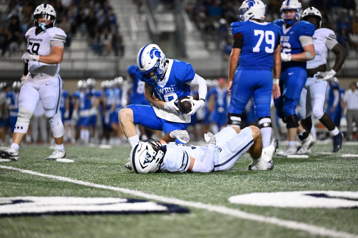 In their first home and conference game of the season, the Spartans narrowly fell to the Westiminster College Titans.