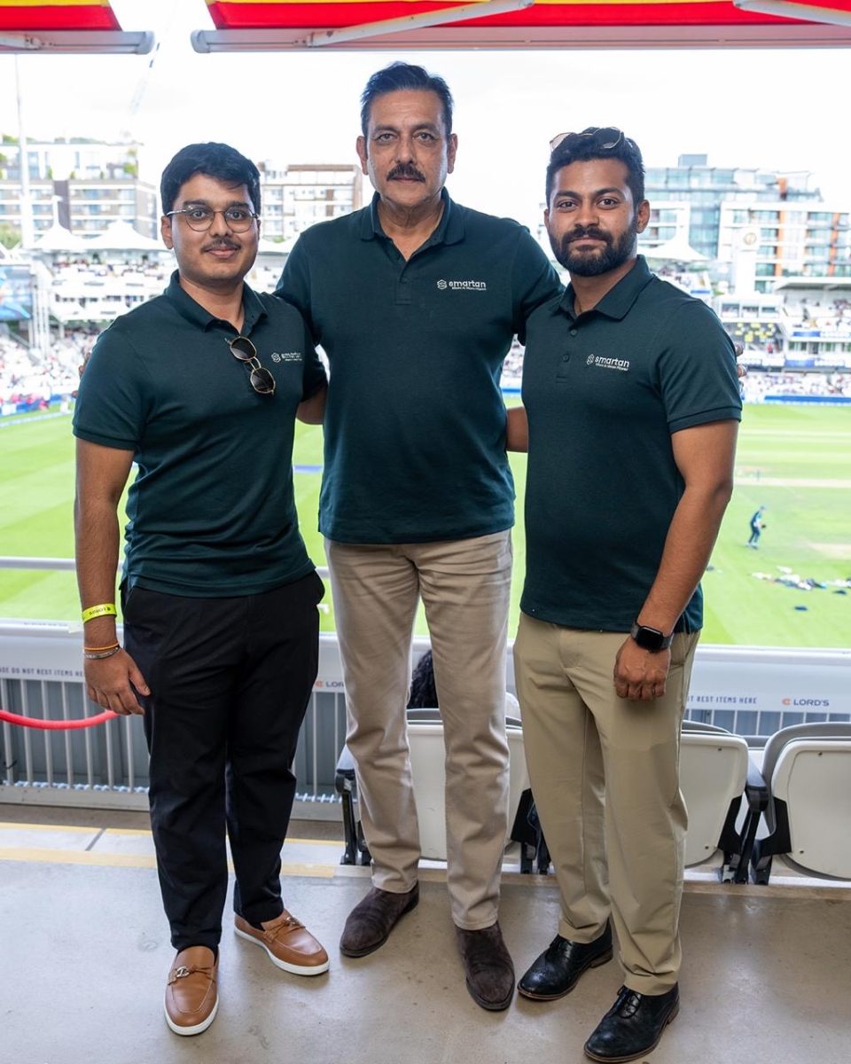 [Group photo] CWRU student Sanjay Thiyagarajan (left) and Purdue University graduate Arunesh Raja (right) co-founded Smartan.ai to help users better understand their workouts, improve results and prevent injury---an effort that has gained the support of former Indian cricket team head coach Ravi Shastri (center).